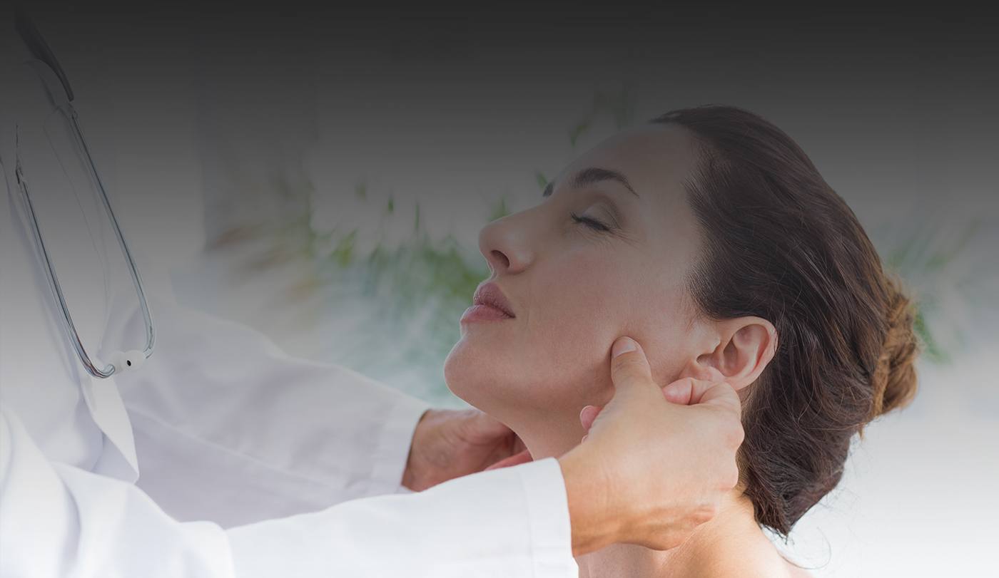 Dentist examining patient during split therapy consultation