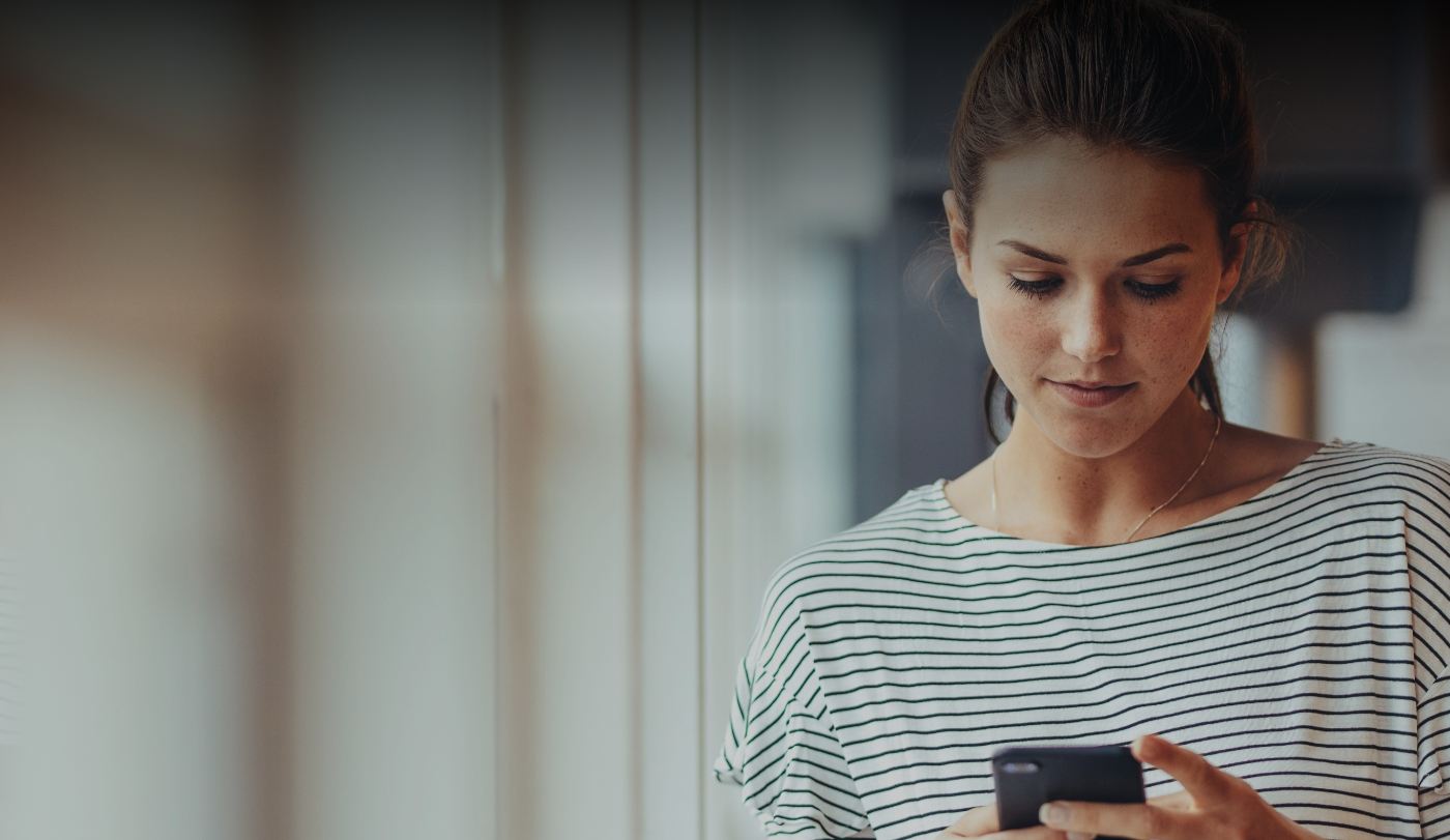 Woman taking T M J dysfunction online assessment using smartphone