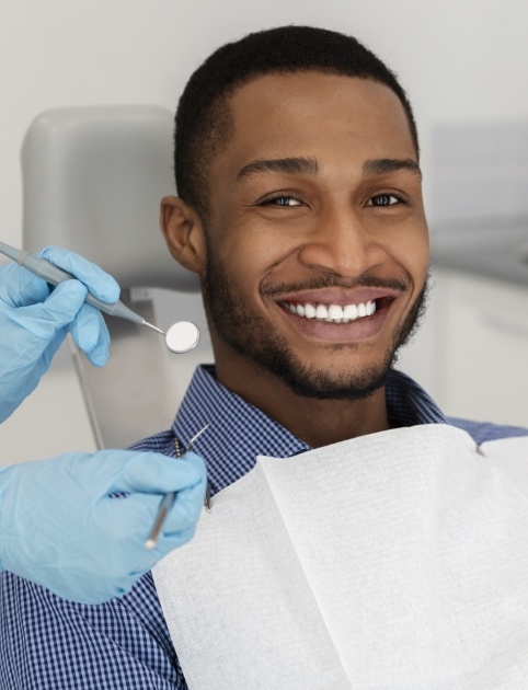 Patient smiling during examination