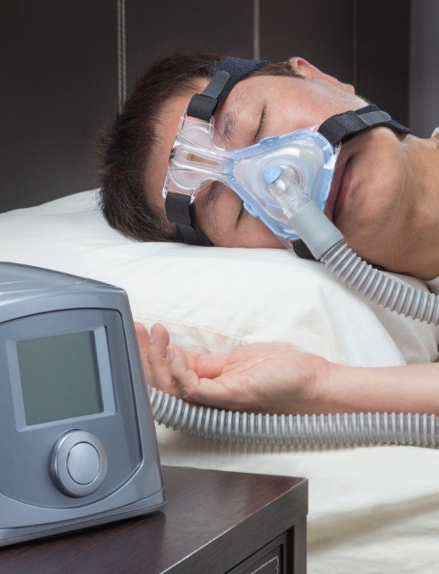 Patient with CPAP mask sleeping